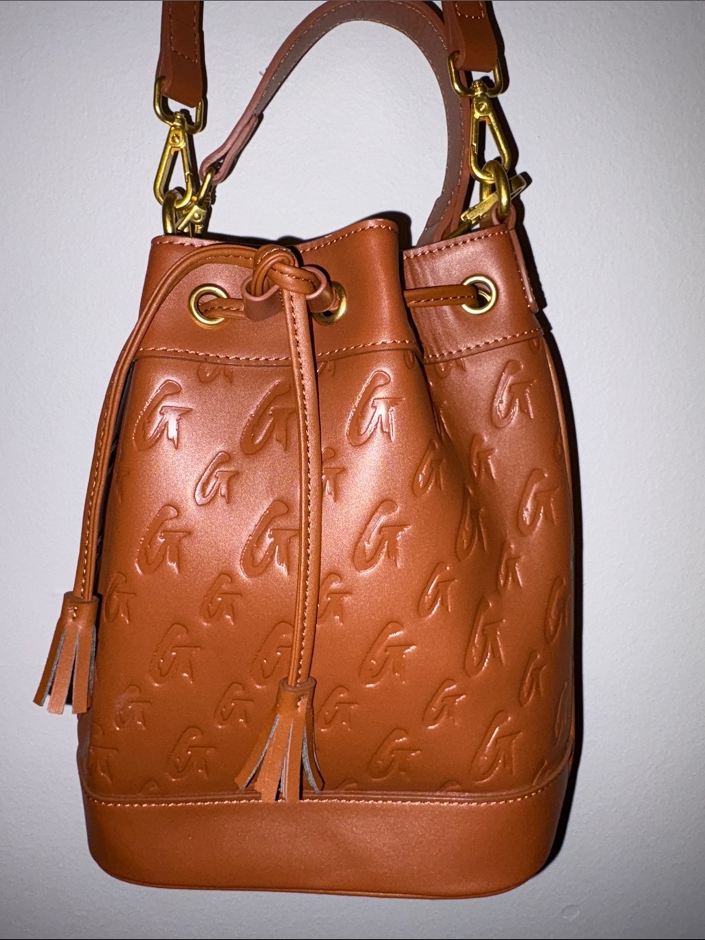 Medium Glamaholic Embossed Tan Bucket Shoulder Bag with Drawstring Closure